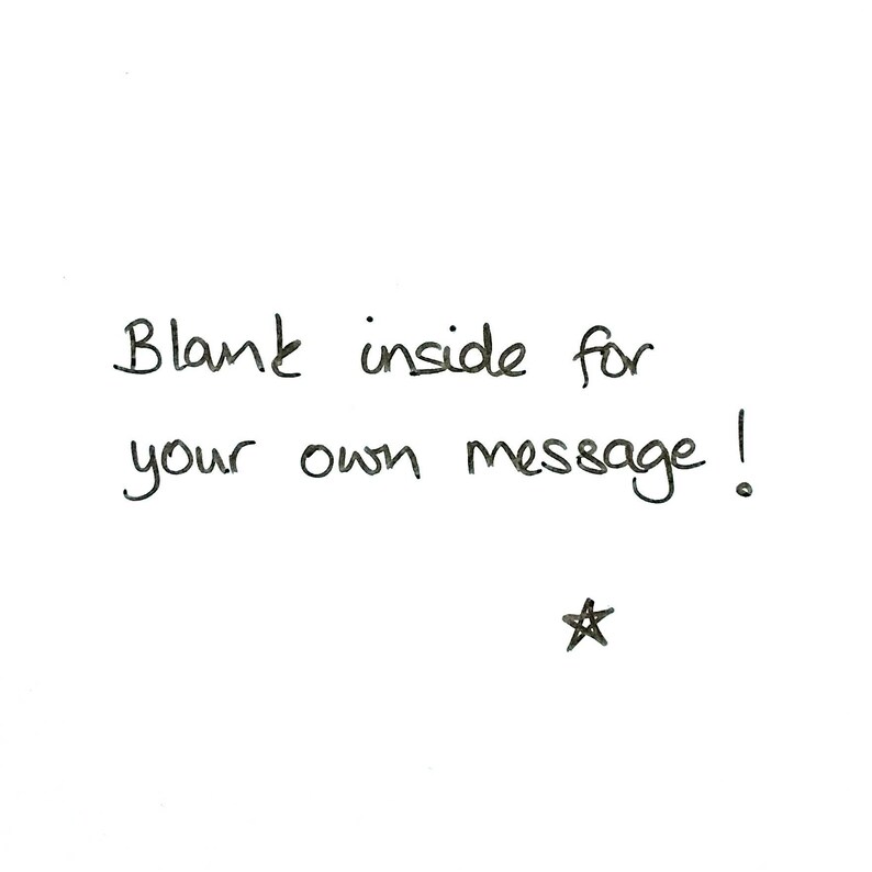 May include: Blank card with the text "Blank inside for your own message!" and a small star drawn in the bottom right corner.