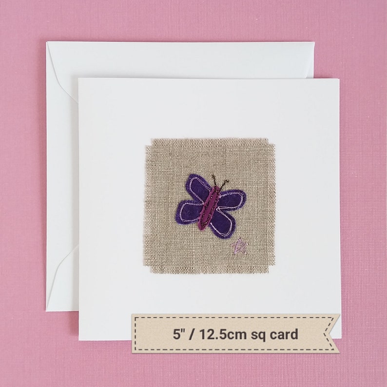 May include: A purple butterfly embroidered on a square piece of burlap fabric, mounted on a white card with a brown label that reads "5"/ 12.5cm sq card".