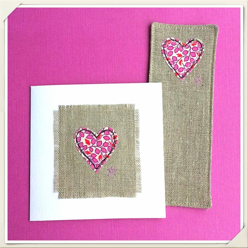 In pure natural linen and white textured card. Linen anniversary greetings card for her Embroidered with pink floral heart design
