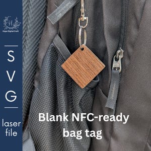 May include: A square, wooden bag tag with a wood grain pattern hangs from a silver keyring attached to a black rucksack. The tag reads "Blank NFC-ready bag tag". The tag is a laser file.