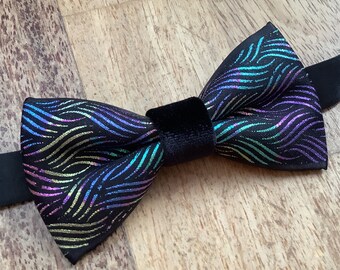 Black bow tie with metallic glitter wave pattern, peacock colors, prettied, resizable neck