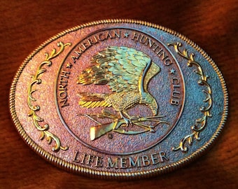 Vintage Belt Buckle North American Hunting Club Life Member Outdoorsman Hunter Sportsman Collectible Gift Silver Gold Metal Eagle Rifle Bow