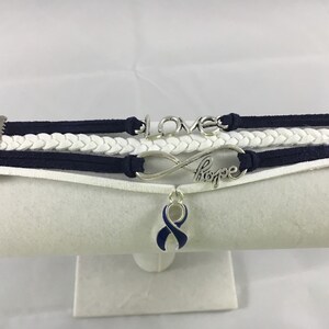 ARDS, Anal Cancer, Arthritis, Colitis, Colon Cancer, Dystonia, Huntington's Disease, Blue and White Suede Multi-Strand Awareness Bracelet imagen 3