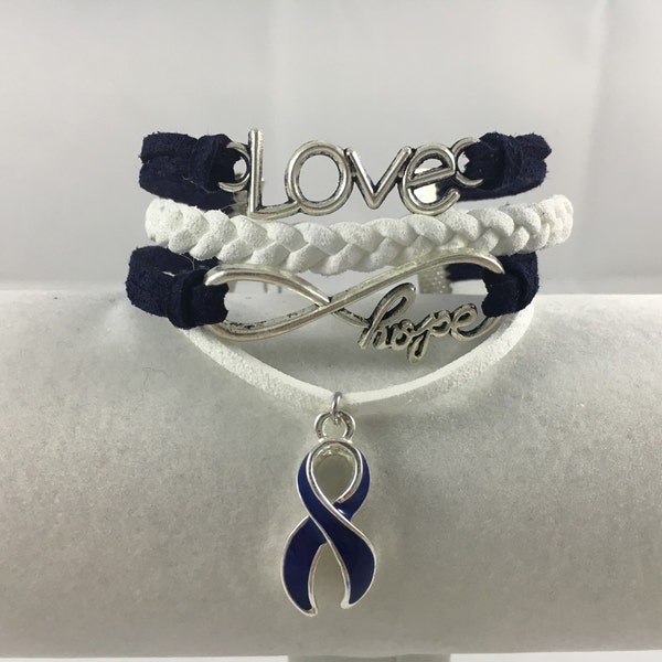 ARDS, Anal Cancer, Arthritis, Colitis, Colon Cancer, Dystonia, Huntington's Disease, Blue and White Suede Multi-Strand Awareness Bracelet