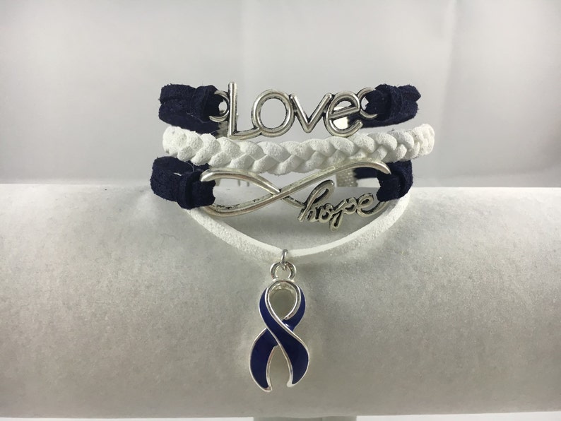 ARDS, Anal Cancer, Arthritis, Colitis, Colon Cancer, Dystonia, Huntington's Disease, Blue and White Suede Multi-Strand Awareness Bracelet imagen 1