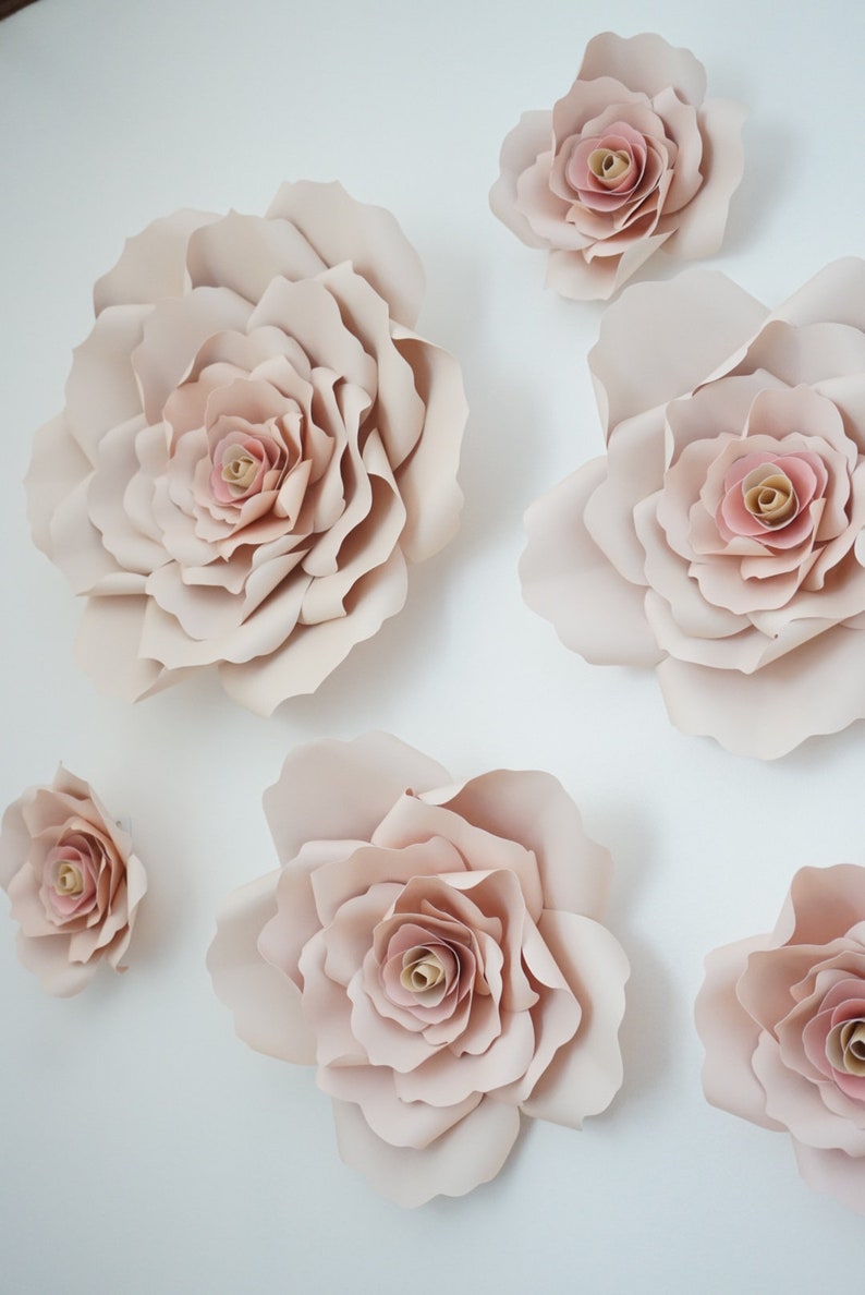 Blush paper roses. Pink & Gold Bridal Shower Decor, DIY + Gift Ideas...certainly lovely indeed. Decorating ideas for bridal showers and gift guide as well as DIY ideas for romantic paper flowers!