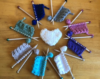 knitting needles with knitting on For decoration small size wooden knitting needles. For the knitting lovers in your life