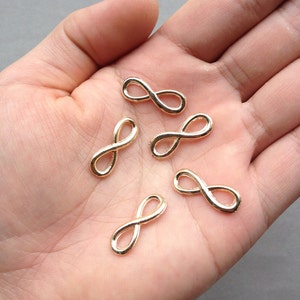 100 pcs of Gold Figure 8 Connector Charms infinite charm 8x23mm