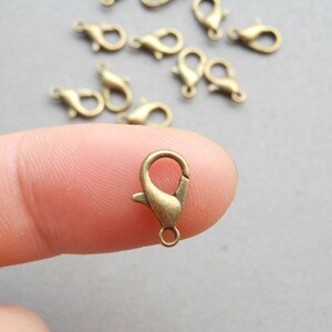 100pcs Antique Bronze Tone Parrot Lobster Clasps 7X12mm