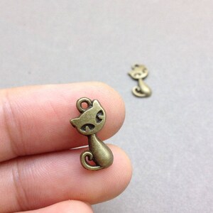 100pcs Antique Silver Cat Robot Charm Pendants 10mmx17mm