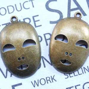 10 pcs of Antique Bronze Halloween Mask Charms 26x40mm