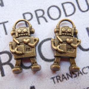 50 pcs of Antique Bronze Lovely Mini Robot Charms 9x17mm