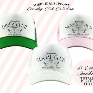 May include: Three white trucker hats with black text and a martini glass graphic. The hats have different names and locations printed on them. The hats are on a pink and white striped background. 13 Colors Available. Totally Custom Text.