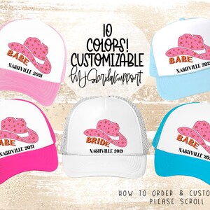 May include: Five trucker hats with a pink cowboy hat design and the text "BABE" and "NASHVILLE 2021". One hat says "BRIDE" instead of "BABE". The hats are in different colours: pink, blue, white, turquoise, and light blue.