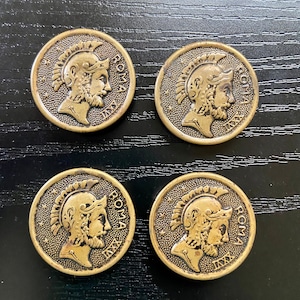 Four Roma XXVI metal buttons