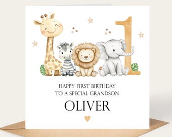 May include: A birthday card featuring a giraffe, zebra, lion, and elephant. The card reads "Happy First Birthday To A Special Grandson" with the name "Oliver" below. The number "1" is also featured.
