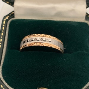 Chic illusion set five stone diamond ring, stamped 10K gold