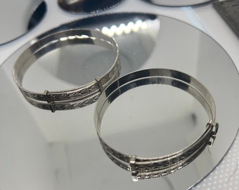 Choice of two traditional sterling silver childs expanding bangle