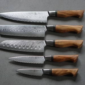 Santoku knife, Chef knife, Damascus knife, Handmade knife, Nakiri Knife, Utility knife. 
Olive wood handle, Ryda knives, ST650 powder steel, Kai knives, Miyabi knives, Global knives, Zwilling chef knife, 5 star knife, Crafted kitchen knives.