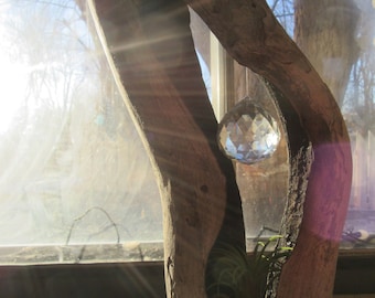 Driftwood sculpture suncatcher