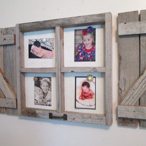 May include: A rustic wooden picture frame with four openings for photos. The frame is made of weathered wood and has a distressed look. The frame is attached to a wall with a rustic wooden background.