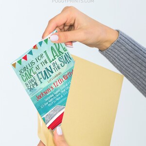 May include: A colorful invitation for a birthday party at the lake. The invitation features a boat on the water, a blue sky, and the text "Join us for cake at the lake & have some fun in the sun. Let's celebrate Jackson's 12th Birthday!"