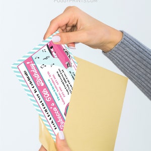 May include: A pink and blue birthday invitation with a pink car and musical notes. The text reads "Rock & Roll On Over To Celebrate Rebecca's 60th Birthday!" and includes the date, time, and location of the event.