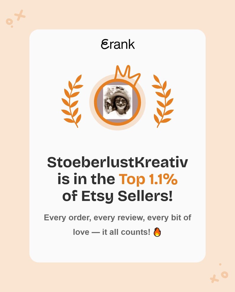 May include: A light peach-colored graphic with the text "Erank" at the top. The image features a circular portrait with a crown, surrounded by laurel branches. The text "StoeberlustKreativ is in the Top 1.1% of Etsy Sellers!" is displayed.