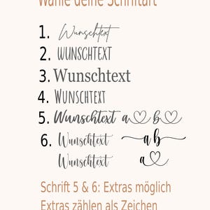 May include: A font selection chart titled "W&auml;hle deine Schriftart" displaying six numbered styles. Each style shows the word "Wunschtext" in a different typeface. Styles 5 and 6 include heart symbols and decorative flourishes. Text at the bottom reads "Schrift 5 & 6: Extras m&ouml;glich" and "Extras z&auml;hlen als Zeichen."