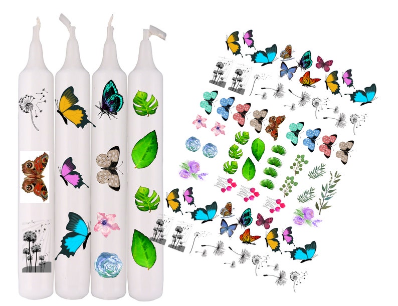 May include: Four white candles decorated with colorful butterfly and floral decals. The butterflies are in various colors, including yellow, blue, pink, and brown. Additional decals include green leaves, flowers, and dandelion illustrations. The candles are arranged vertically.