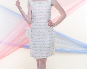 MAE (Size 4-6): Knee length white and ivory lace shift dress with speckles of color, small bow, and lace fold back detail.