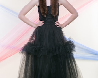 ROXY (Size 1-2): Black halter gown with full skirt constructed of layers of lace and tulle.