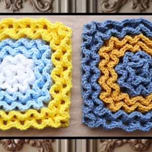 May include: Two crocheted squares, one in yellow, blue, and white, and the other in blue and yellow. The squares are made with a ripple stitch pattern.