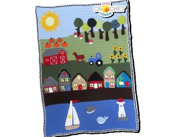May include: A crocheted calendar blanket with a folk art theme. The blanket features a red barn, houses, a blue truck, a horse, a sun, pumpkins, trees, sunflowers, a sailboat, and whales. The blanket is bordered with a black and white trim.