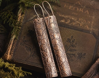 Forget Me Not Bars. Long copper bar earrings featuring forget me nots. Hand made in alaska.
