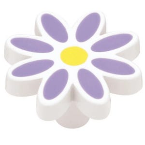 May include: A white flower-shaped cabinet knob with a purple daisy design and a yellow centre.