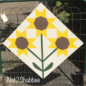 Not2Shabbee has Barn Quilts! Hand Painted Made to Order Sunflower Pattern Barn Quilt 24 x 24 on outdoor sign board.