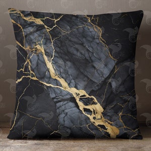 May include: Black and gold marble patterned throw pillow. The pillow has a dark gray background with gold veins running through it.