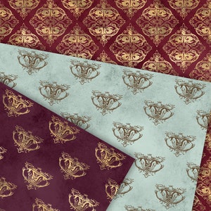 May include: Two patterned papers with a gold and burgundy design. The top paper is light blue with a gold pattern of a stylized bird. The bottom paper is burgundy with a gold pattern of a stylized flower.