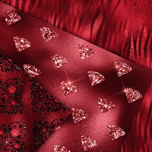 May include: Red fabric with a glittery diamond pattern. The fabric has a textured surface and is folded over to reveal a black and red damask pattern.