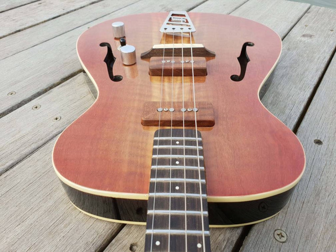 Jazzy Baritone semihollow body electric ukulele. 19 Etsy