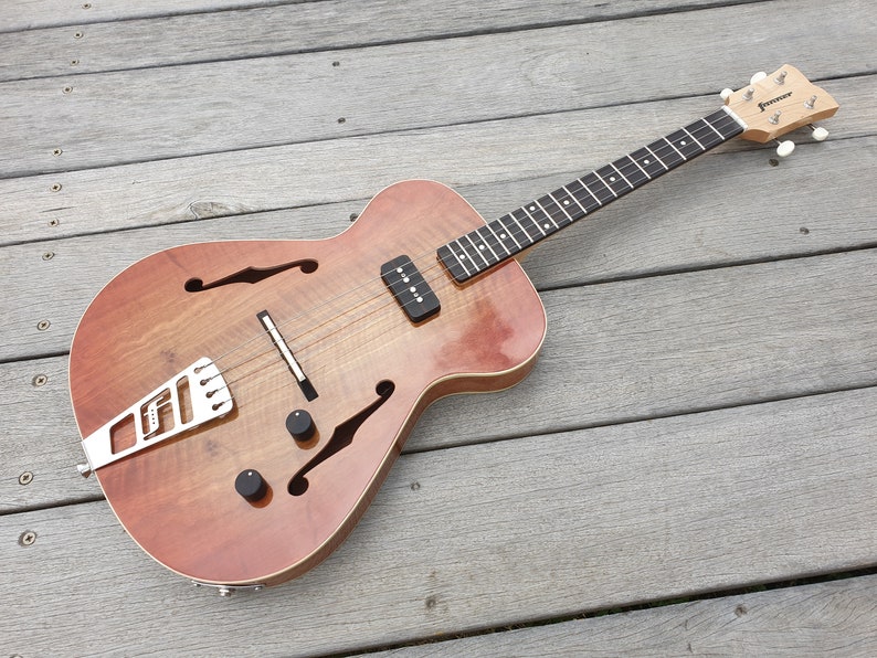 Jazzy Baritone semihollow body electric ukulele. 19 Etsy