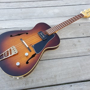 Custom build Jazzy Baritone semi-hollow body electric ukulele. Single p90 neck pickup. Handmade to order. Luthier set up. Gig Bag included.