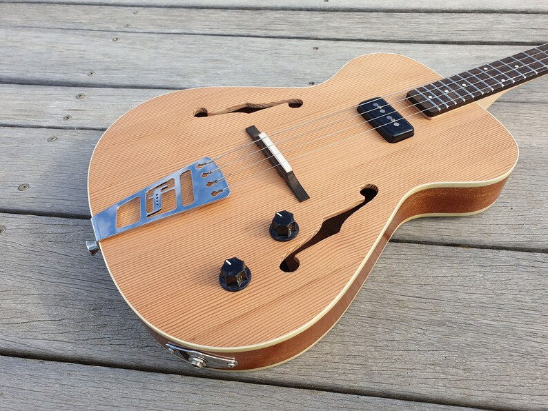 Jazzy Baritone semihollow body electric ukulele. 19 Etsy