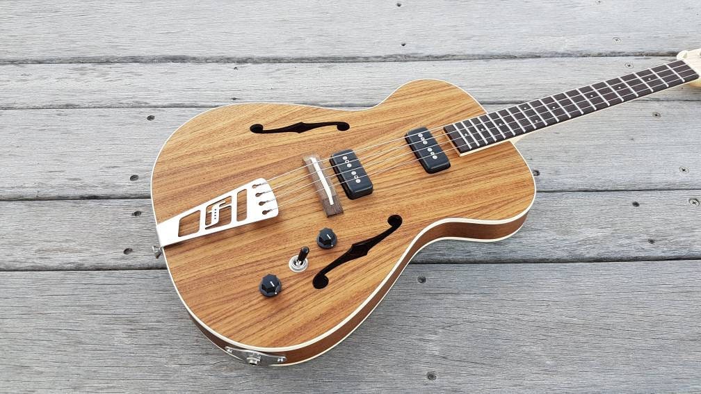 Jazzy Baritone semihollow body electric ukulele. 19 Etsy