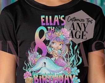 May include: A black t-shirt with a colorful graphic featuring a mermaid riding a dolphin, with the text "Ella's 8th Birthday". The shirt also has the text "Customize This Any Age". Balloons and streamers are in the background.