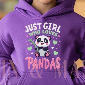 May include: A purple hooded sweatshirt with the text "JUST GIRL WHO LOVES PANDAS" and a graphic of a panda holding bamboo. The sweatshirt has a kangaroo pocket and is worn by a smiling child.