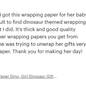 The image is a review of a dinosaur-themed gift wrapping paper, specifically the "Boho Girl Dinosaur Wrapping Paper Dino, Girl Dinosaur Gift...". The review is written in a text format, with a star rating at the top and a description of the product.