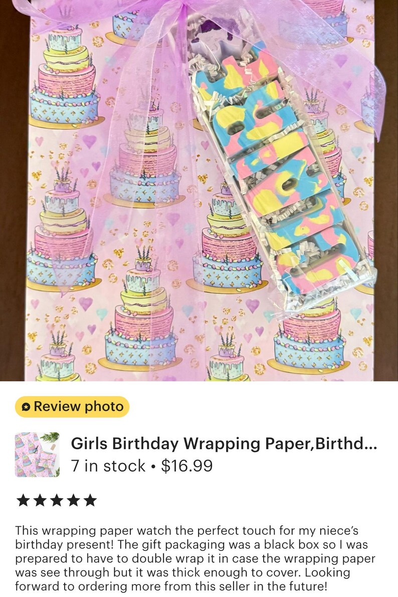 The image is a review photo of a girls birthday wrapping paper, Birthd.... 7 in stock priced at $16.99. The wrapping paper is described as a perfect touch for a birthday present, and the seller's note mentions that the gift packaging was a black box, which was prepared to have enough wrapping paper to cover the gift. The seller's rating of 5 stars indicates that the product is highly recommended.