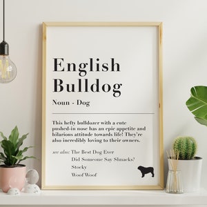 Puede incluir: Un diseño de arte de pared imprimible con una ilustración en blanco y negro de un Bulldog Inglés con el texto "English Bulldog" y una definición de la raza. El texto incluye las palabras "bulldozer corpulento", "nariz chata linda", "apetito épico", "actitud divertida", "increíblemente cariñoso", "El mejor perro del mundo", "¿Alguien dijo bocadillos?", "Robusto", y "Guau Guau".